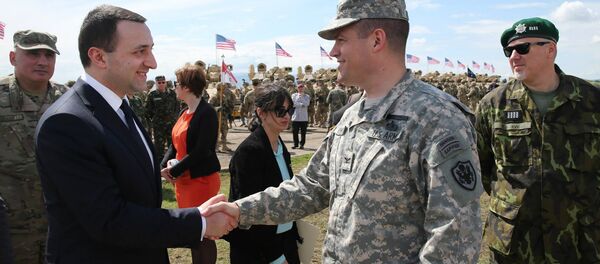 Ираклий Гарибашвили на учениях Ираклий Гарибашвили на учениях - Sputnik Грузия