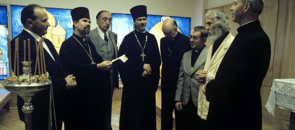 Священнослужители в здании Культурного центра Олимпийской деревни во время XXII летних Олимпийских игр. - Sputnik Грузия