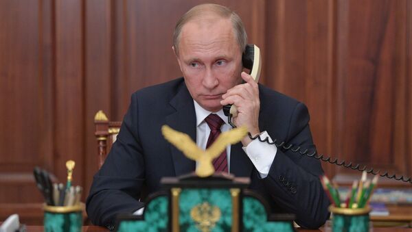 Президент РФ В. Путин ведет телефонный разговор - Sputnik Грузия