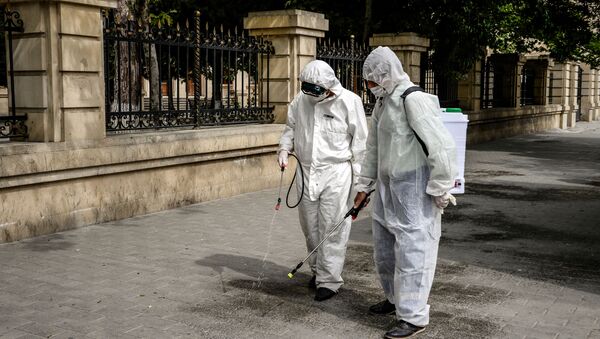 Дезинфекция улиц в Баку во время пандемии коронавируса COVID 19 - Sputnik Грузия