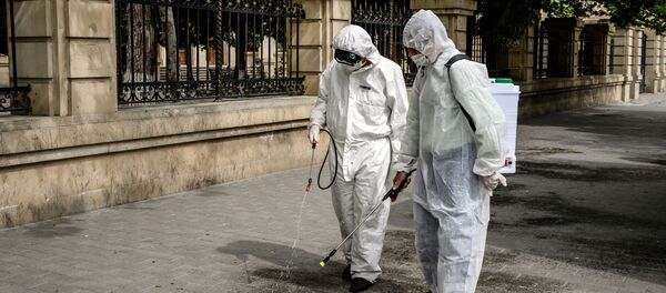 Дезинфекция улиц в Баку во время пандемии коронавируса COVID 19 - Sputnik Грузия