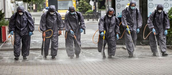 Дезинфекция улиц в Баку во время пандемии коронавируса COVID 19 Дезинфекция улиц в Баку во время пандемии коронавируса COVID 19 - Sputnik Грузия