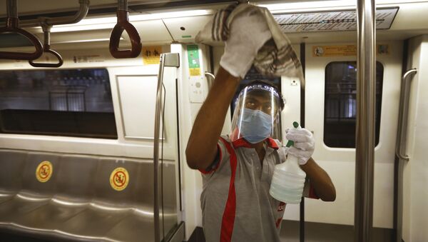 Дезинфекция вагонов метро в Нью Дели в Индии во время пандемии коронавируса COVID 19 - Sputnik Грузия