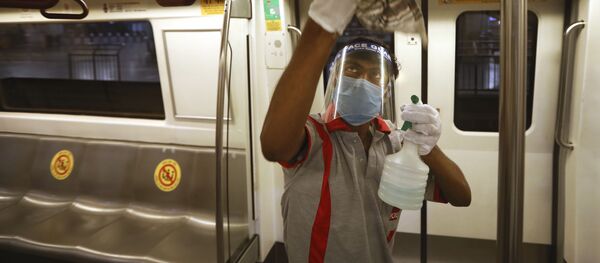 Дезинфекция вагонов метро в Нью Дели в Индии во время пандемии коронавируса COVID 19 - Sputnik Грузия