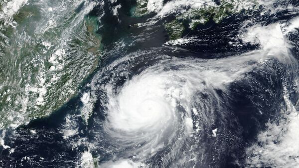 Вид из космоса на тайфун Майсак, проходящий над Японией - Sputnik Грузия