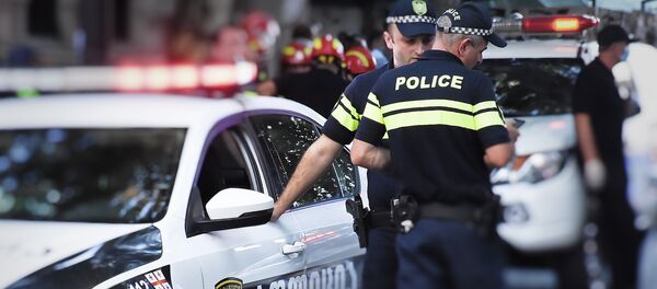 Патрульная полиция и следователи на месте происшествия  - Sputnik Грузия