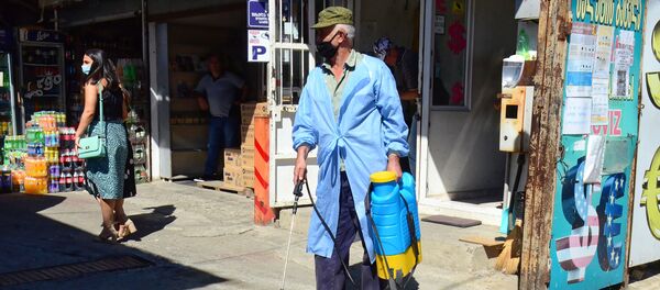 Дезинфекция территории на рынке Хопа в столице Аджарии Дезинфекция территории на рынке Хопа в столице Аджарии - Sputnik Грузия