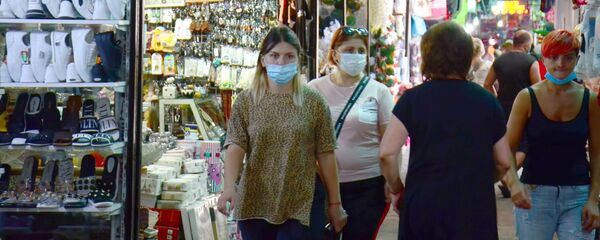 ადამიანები პირბადეებით ხოფის ბაზრობაზე - Sputnik საქართველო