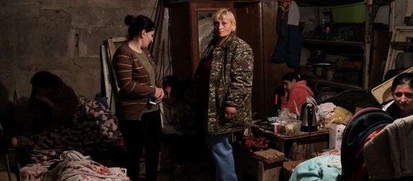 Люди в военной форме в Степанакерте, Нагорный Карабах - Sputnik Грузия