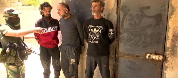 Задержание боевиков вблизи г. Тадмор в Сирии Задержание боевиков вблизи г. Тадмор в Сирии - Sputnik Грузия