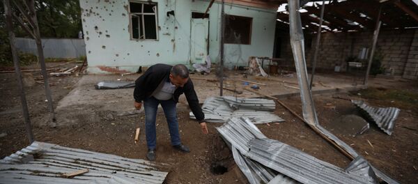Разрушения в городе Агдам, Азербайджан после обстрела со стороны Нагорного Карабаха Разрушения в городе Агдам, Азербайджан после обстрела со стороны Нагорного Карабаха - Sputnik Грузия