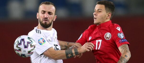 Ника Квеквескири и Виталий Лизакович. Матч между сборными Грузии и Беларуси в рамках Лиги наций УЕФА - Sputnik Грузия