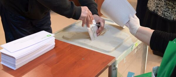 კენჭისყრა საარჩევნო უბანზე კენჭისყრა საარჩევნო უბანზე - Sputnik საქართველო