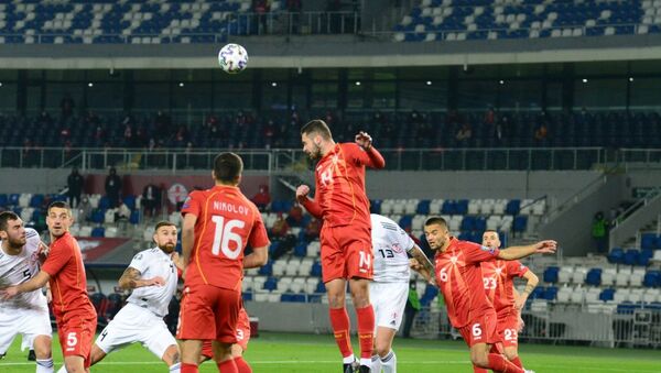 Матч между сборными Грузии и Македонии по футболу при пустых трибунах на стадионе Динамо Арена - Sputnik Грузия