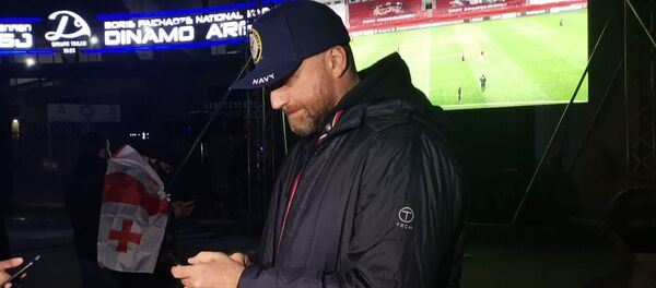 Зураб Джапаридзе. Гирчи среди болельщиков. Матч между сборными Грузии и Македонии по футболу при пустых трибунах на стадионе Динамо Арена Зураб Джапаридзе. Гирчи среди болельщиков. Матч между сборными Грузии и Македонии по футболу при пустых трибунах на стадионе Динамо Арена - Sputnik Грузия