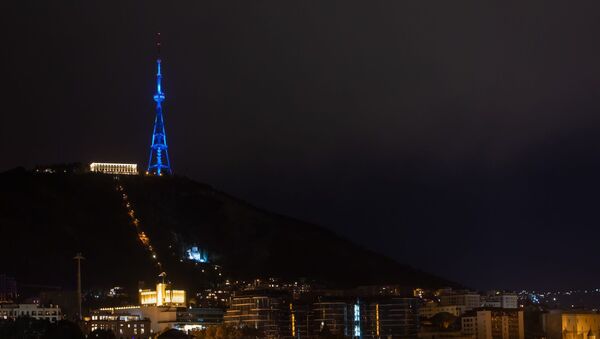 Тбилисская телевышка в цветах программы элиминации рака матки - Sputnik Грузия