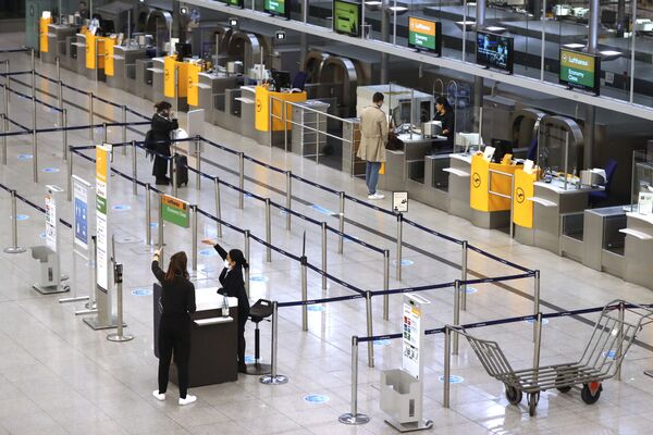 Так выглядит один из терминалов в аэропорту в Мюнхене, Германия, во время пандемии коронавируса - Sputnik Грузия