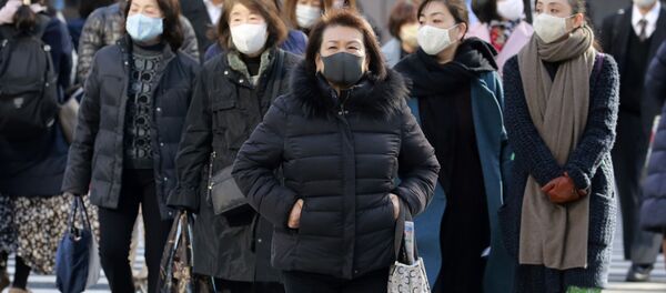 Пандемия коронавируса COVID 19 - жители Японии в масках Пандемия коронавируса COVID 19 - жители Японии в масках - Sputnik Грузия