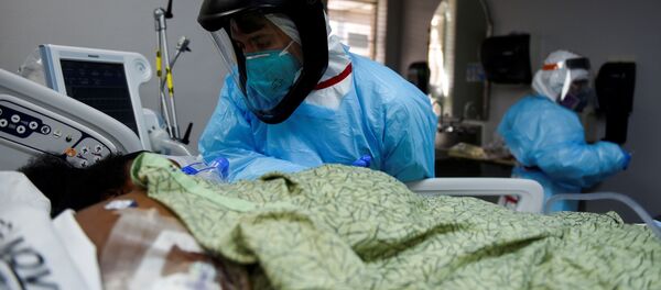 Эпидемия коронавируса COVID 19 - медики и врачи в больнице в реанимации - Sputnik Грузия