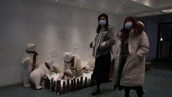 Пандемия коронавируса COVID 19 - жители Китая в масках - Sputnik Грузия