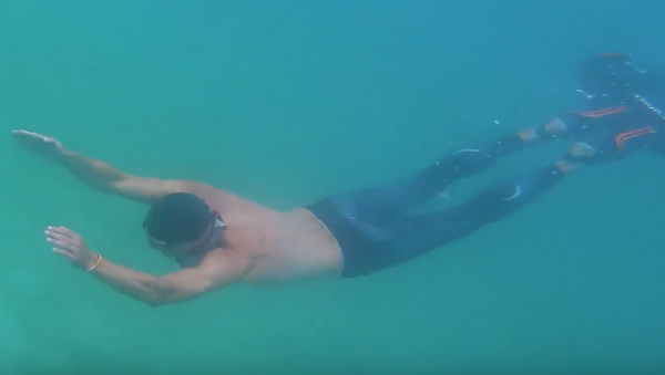 Вот это рекорд! Датский пловец проплыл 202 метра, не дыша - Sputnik Грузия