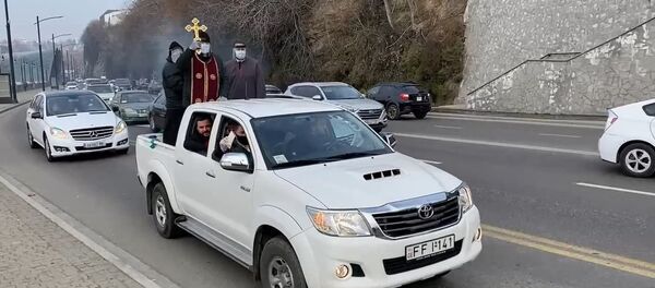 უჩვეულო ალილო: მღვდლებმა ქალაქი მანქანებით შემოიარეს - ვიდეო უჩვეულო ალილო: მღვდლებმა ქალაქი მანქანებით შემოიარეს - ვიდეო - Sputnik საქართველო