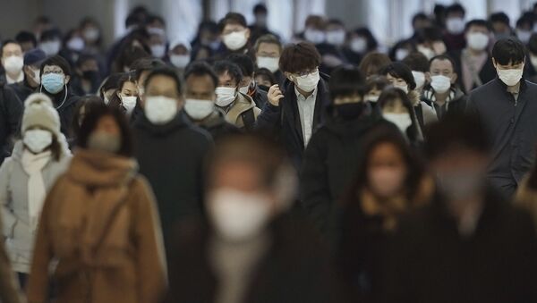 Пандемия коронавируса COVID 19 - жители Токио, Япония в масках - Sputnik Грузия