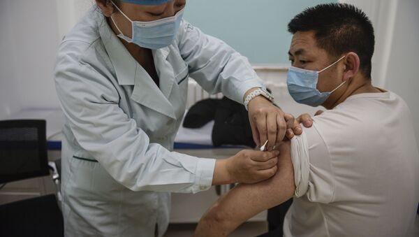 Пандемия коронавируса COVID 19 - вакцинация жителей Пекина, Китай - Sputnik Грузия