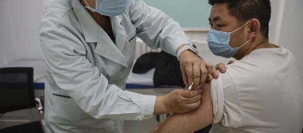 Пандемия коронавируса COVID 19 - вакцинация жителей Пекина, Китай - Sputnik Грузия