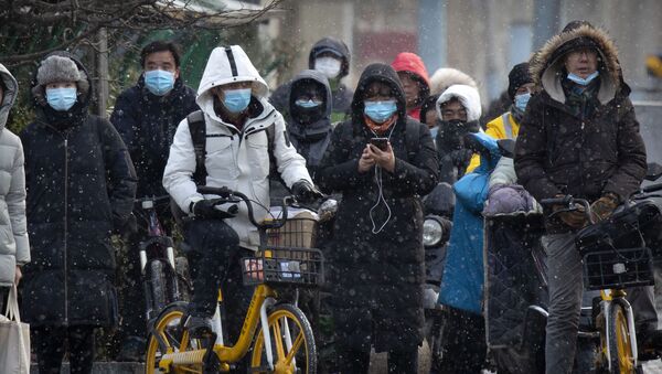 Пандемия коронавируса COVID 19 - люди в маска в Пекине, Китай - Sputnik Грузия