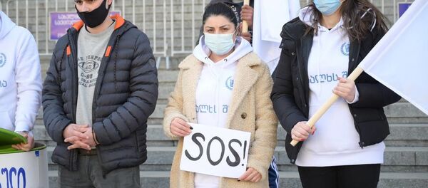 Акция протеста у здания парламента Грузии против ограничений и запретов 25 января 2021 года - Sputnik Грузия