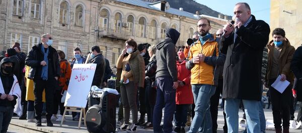 Всеобщая акция протеста против ковид-ограничений у здания правительства Грузии 30 января 2021 года - Sputnik Грузия