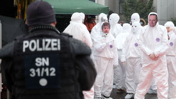 Пандемия коронавируса COVID-19 - акция протеста против ограничений в Германии - Sputnik Грузия