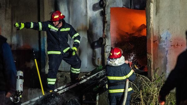 Пожар на складе на рынке Элиава 12 февраля 2021 года  - Sputnik Грузия