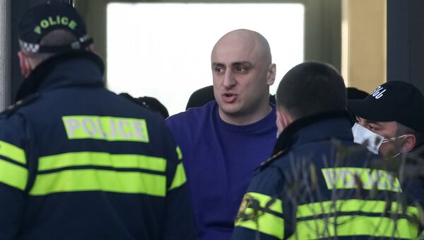 Арестованный Ника Мелия. Штурм офиса Единого нацдвижения утром 23 февраля 2021 года  - Sputnik Грузия