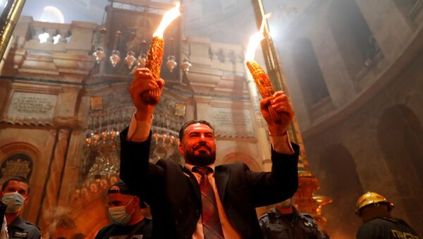 Схождение Благодатного огня в Иерусалиме на православную Пасху - Sputnik Грузия