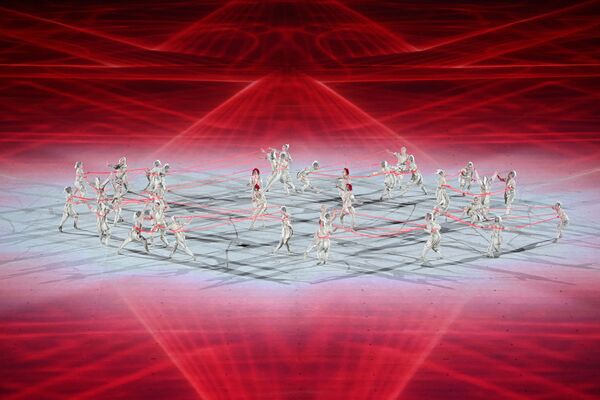 Выступление танцоров во время театрализованного представления на церемонии открытия Олимпийских игр в Токио  - Sputnik Грузия