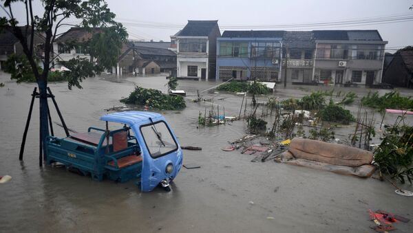 Затопленная деревня в пригороде Дунцяо в Нинбо, провинция Чжэцзян, Китай - Sputnik Грузия