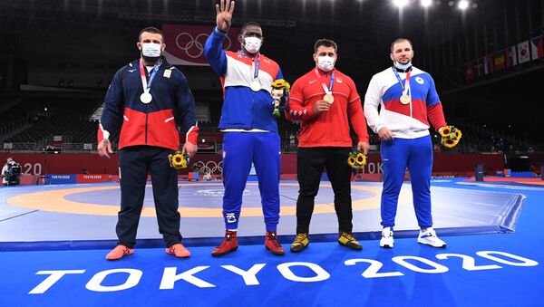 Борец Якоб Каджая с серебряной наградой на Олимпийских играх - Sputnik Грузия