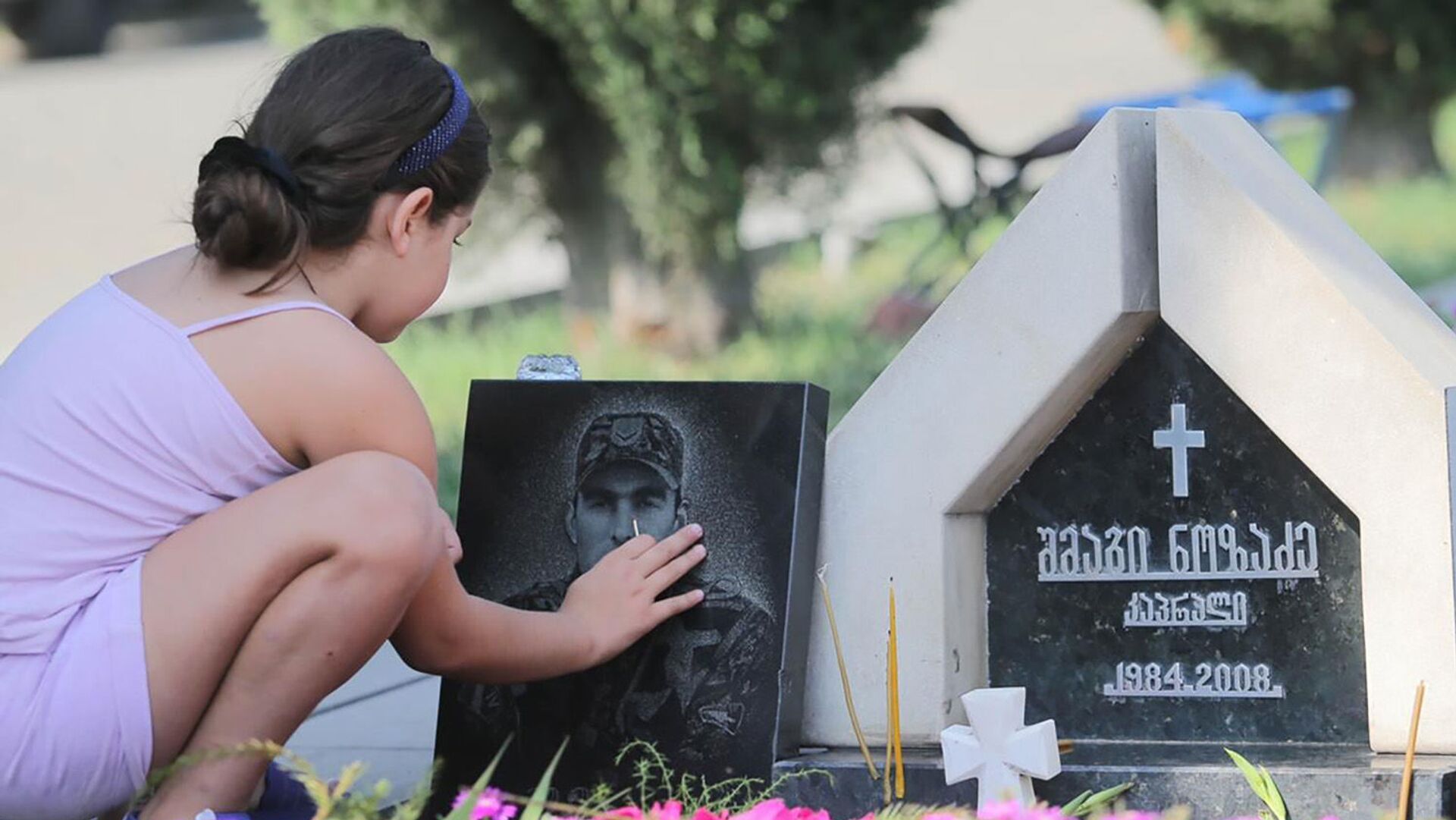 Братское кладбище Мухатгверди, где похоронены военнослужащие, погибшие во время войны 08.08.08 - Sputnik Грузия, 1920, 08.08.2021