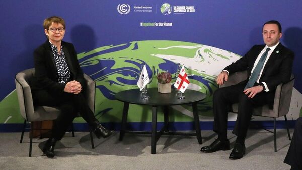 Президент ЕБРР Одиль Рено-Бассо и премьер-министр Грузии Ираклий Гарибашвили - Sputnik Грузия