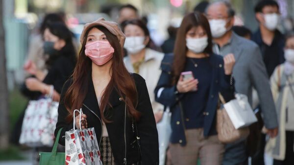 Пандемия коронавируса - жители Японии в масках - Sputnik Грузия
