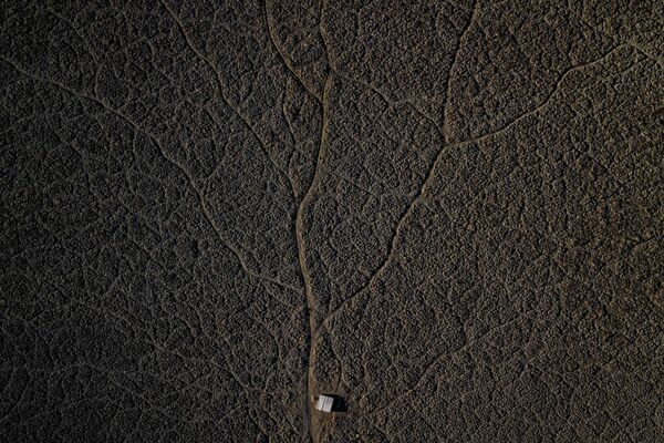 დამშრალი ზღვის ფსკერის აეროფოტო ჩილეში, აკულეოს ლაგუნაში. ლაგუნა მთლიანად პირველად დაშრა 2000 წლის განმავლობაში - პლანეტაზე კლიმატური ცვლილების შედეგად - Sputnik საქართველო