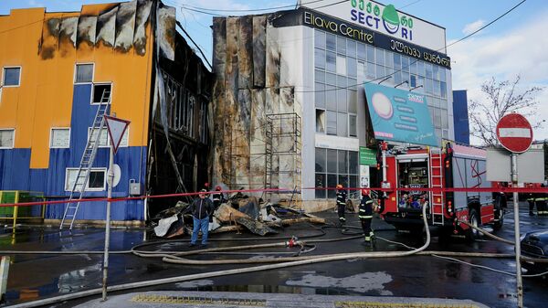 Пожар на строительном рынке Элиава 7 февраля 2022 года - Sputnik Грузия