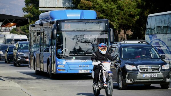 Синий пассажирский автобус MAN - Sputnik Грузия