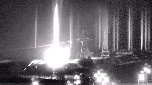 Фрагмент из видеозаписи, на которой изображены несколько взрывов на украинской атомной электростанции в Запорожье - Sputnik Грузия