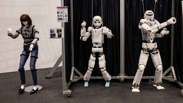 Роботы Kawasaki humanoid на Международной выставке роботов в Токио - Sputnik Грузия