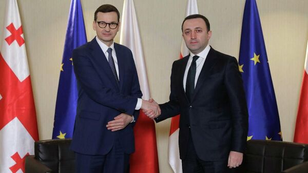Премьер-министр Польши Матеуш Моравецкий и премьер-министр Грузии Ираклий Гарибашвили - Sputnik Грузия