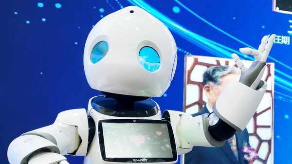 Робот CanBot на одном из стендов на Всемирной конференции робототехники (World Robot Conference) в Пекине - Sputnik Грузия