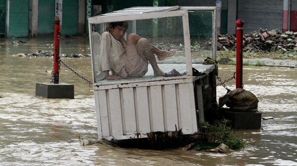 Затопленные улицы во время наводнения в Пакистане  - Sputnik Грузия